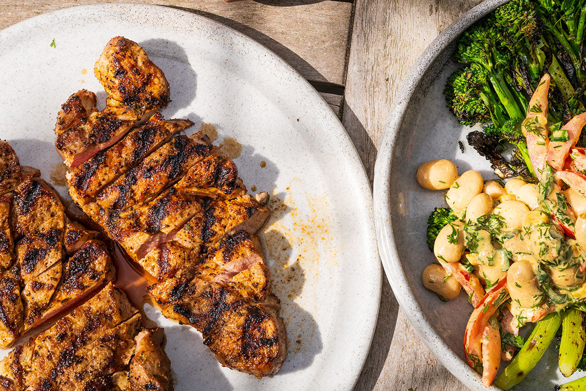 Pork Scotch fillet, spring onion & white bean salad with Street BBQ Tuscan Alle Brace